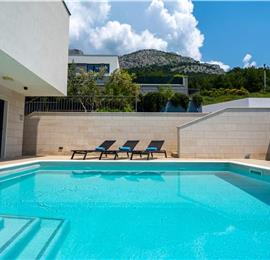 5 bedroom beachfront villa with heated pool near Omis, sleeps 9